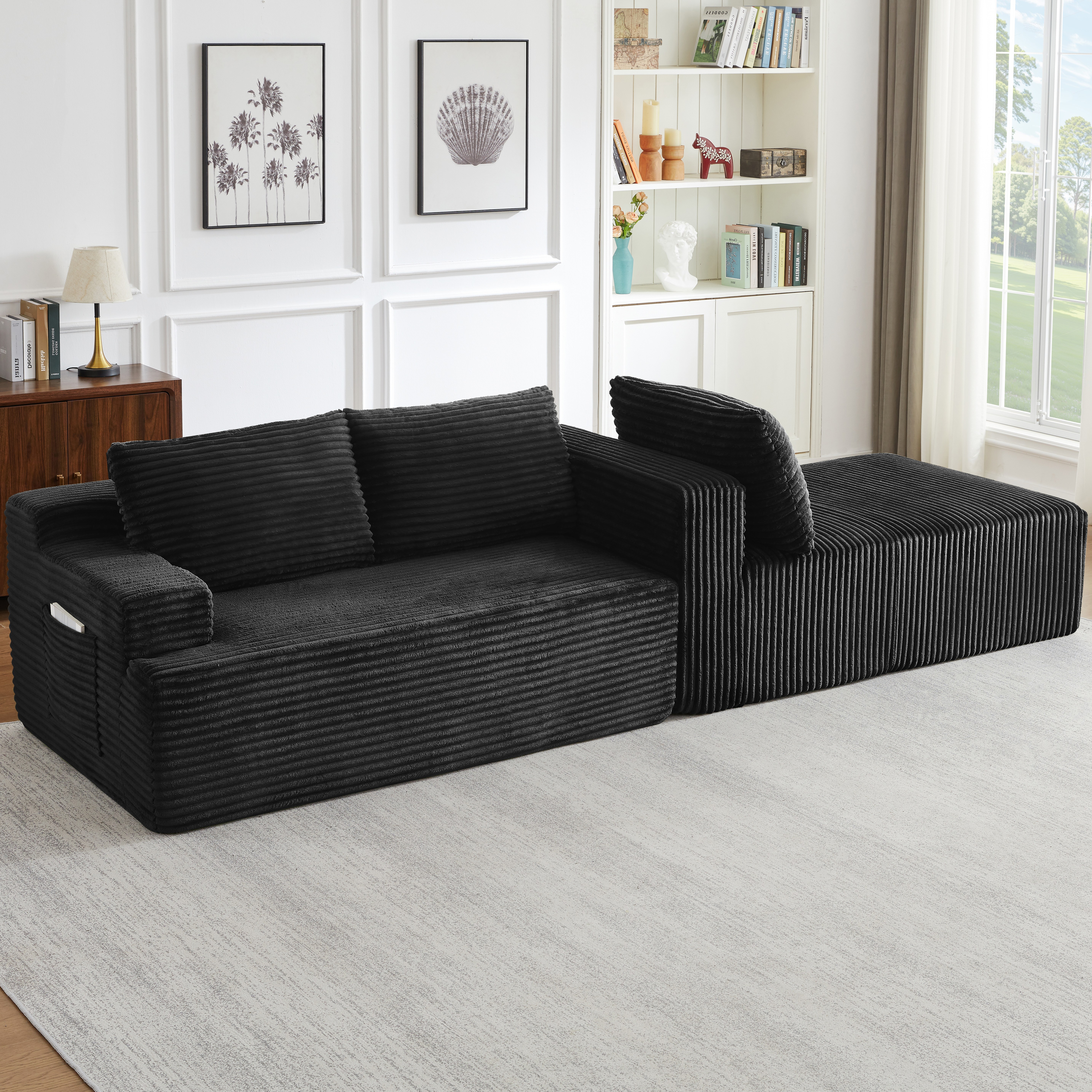 Canapé d'angle modulable noir dans le salon